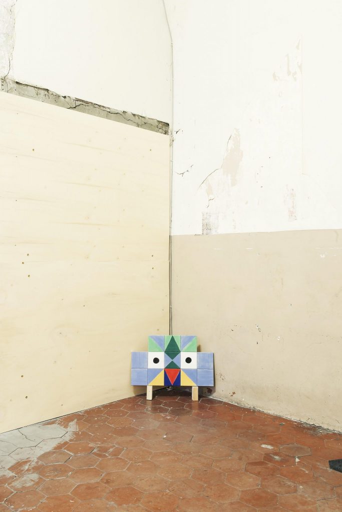 <i>from down, from up and in between</i>, 2013 
</br>
Hand painting on tiles, wood structure
</br>
45 x 75 x 1 cm / 17.7 x 29.5 x 0.4 in
</br>
installation view, fondazione morra greco, naples
>