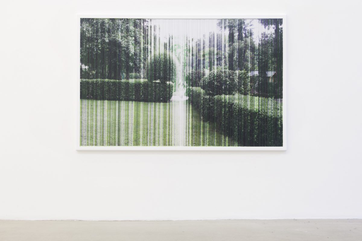 <i>a rainy day transfiguration of laura</i>, 2012</br>
layered cut-outs photographs</br>114 x 165 cm