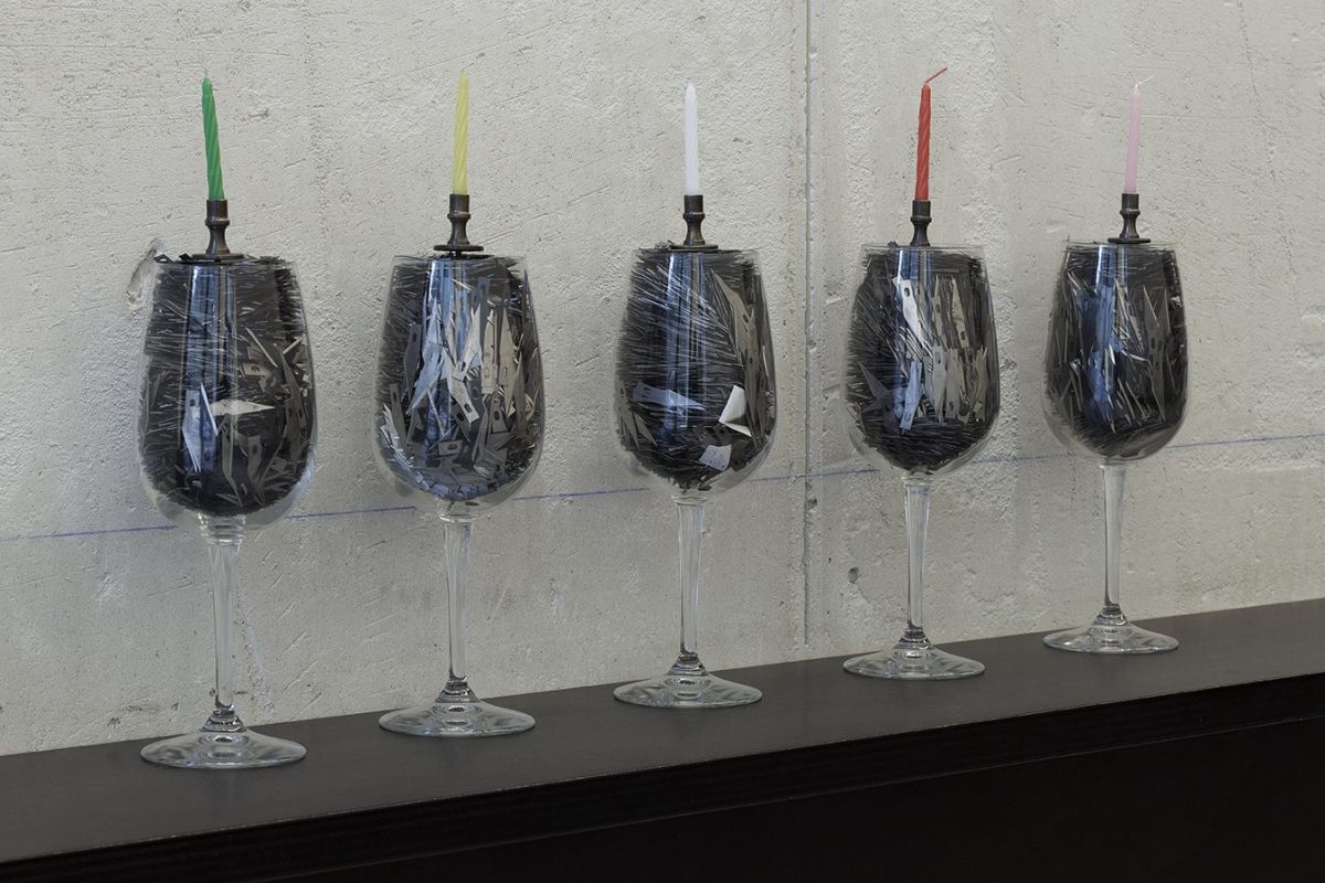 <i>happy birthday to me</i>, 2012</br>
wine glass filled with x-acto blades, brass candle holder, birthday candle</br>30 x 8 cm each