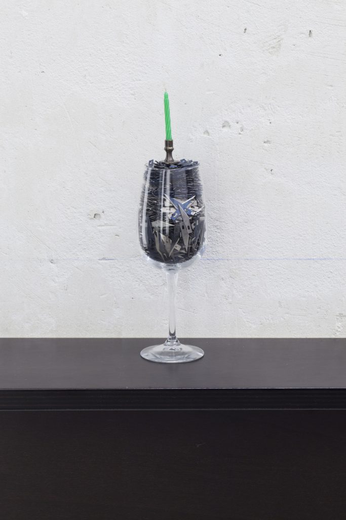 <i>happy birthday to me</i>, 2012</br>
wine glass filled with x-acto blades, brass candle holder, birthday candle</br>30 x 8 cm each
