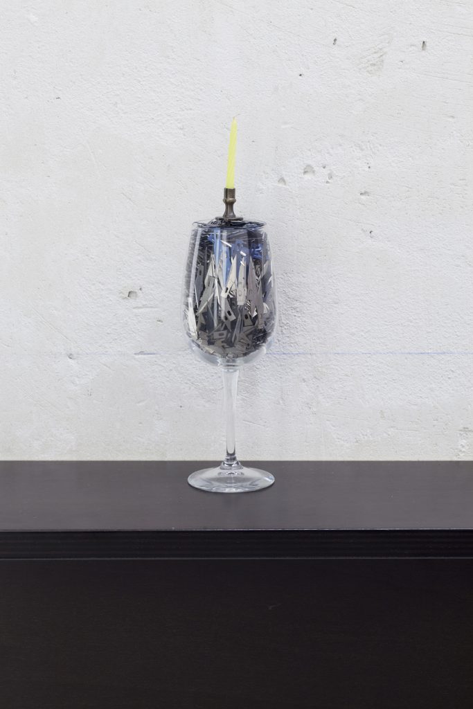 <i>happy birthday to me</i>, 2012</br>
wine glass filled with x-acto blades, brass candle holder, birthday candle</br>30 x 8 cm each