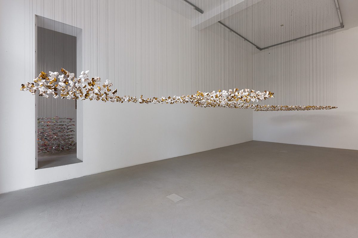 pae white, pop storm, 2011
japanese paper clay, black thread, variable dimensions