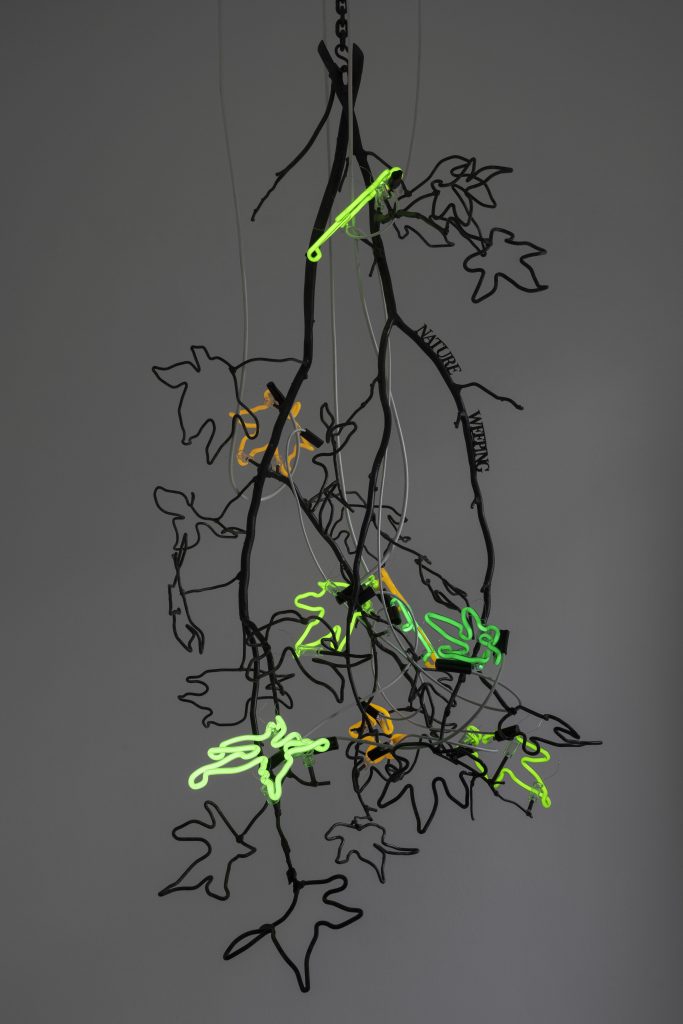 <i>Chandeliers of Interconnectedness </br>(NATURE WEEPING;
quote by Susan Griffin)</i>, 2022 </br>
steel, neon lights</br>
140 x 90 x 85 cm / 55.1 x 35.4 x 33.4 in