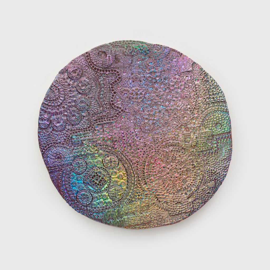 <i>Future Proof Bird</i>, 2021 </br>
dichroic coating on glazed ceramic</br>
44,4 x 44,4 x 3,8 cm / 17.5 x 17.5 x 1.5 in