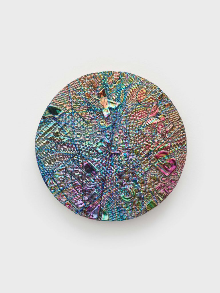 <i>Pixie Stix</i>, 2022 </br>
dichroic coating on glazed ceramic</br>
33,5 x 33,5 x 3,8 cm / 13.2 x 13.2 x 1.5 in