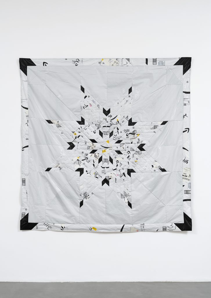 <i>Manta / Mantle</i>, 2025</br>Used Amazon.co delivery envelope</br>
188 x 183 cm / 74 x 72>