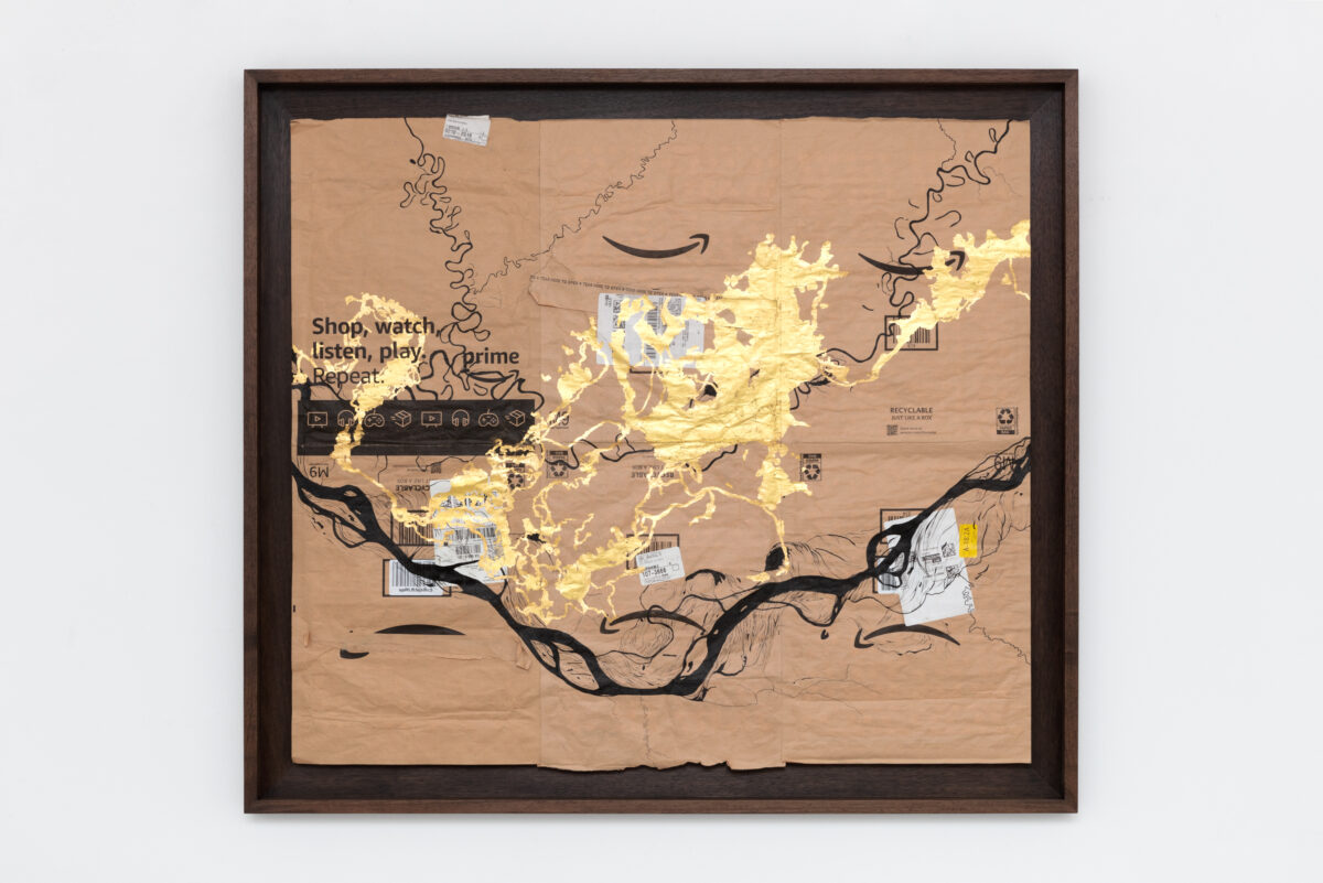 <i>Rio de Ouro | River of Gold</i>, 2024 </br>
23-karat gold leaf, and archival ink on used Amazon paper
envelopes</br>
104,1 x 116,8 cm / 41 x 46 in