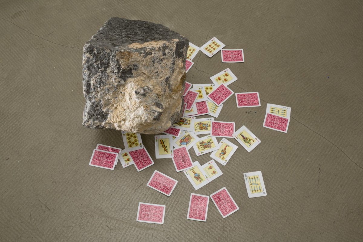 <i>elvissa (ibiza)</i>, 2010
</br>
found stone from ibiza, spanish playing cards, variable dimensions>