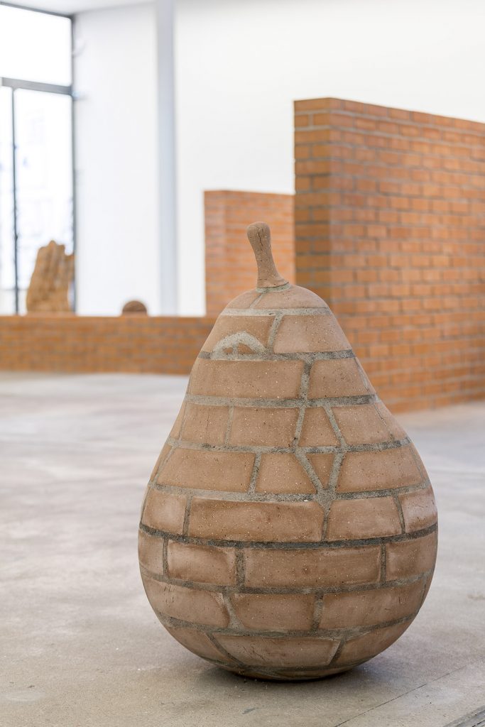 <i>pear (birne)</i>, 2018 
</br>
bricks, cement, 87 x 58 x 58 cm / 34.2 x 22.8 x 22.8 in
</br>
installation view, kw institute for contemporary art, berlin>