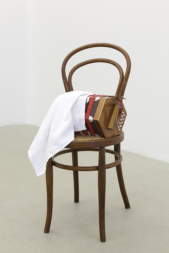 <i>fantocce</i>, 2011</br>chair, harmonica, textile</br>80 x 43 x 43 cm / 31.5 x 16.9 x 16.9 in