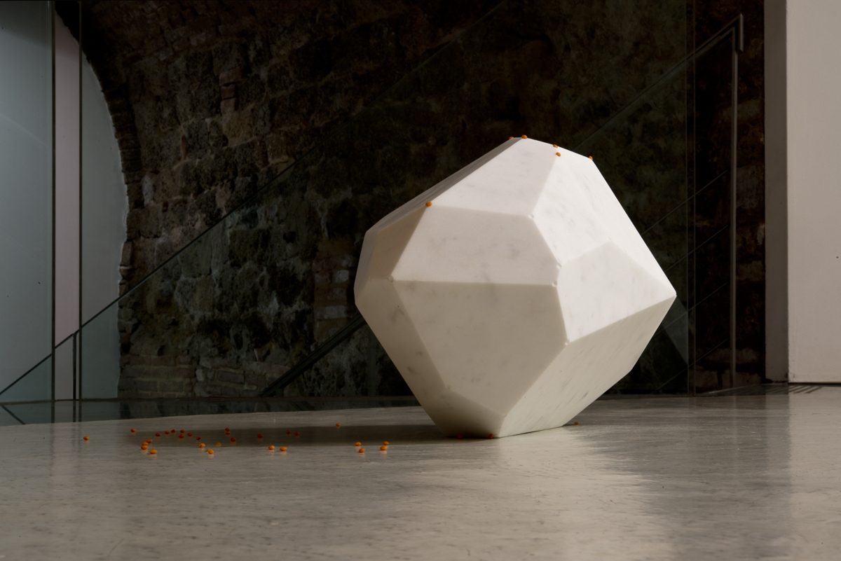 <i>Divoratore di spazio</i>, 2008
</br>
white marble, spheres of various materials>