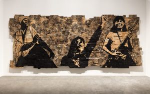 <i>a call to arms: building a fem army</i>, 2017 
</br>
acrylic marker on cardboard, 284,5 x 694 x 20,3 cm / 112 x 273 x 8 in
</br>
installation view, art basel unlimited, basel