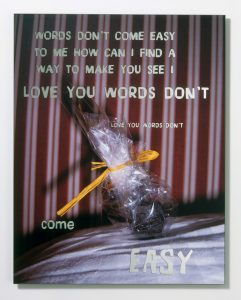<i>words (don’t come easy)</i>, 2006
</br>
photograph on mirror, 
90 x 70 cm / 35.4 x 27.5 in