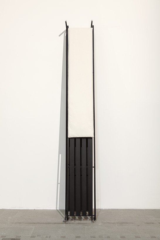 <i>that is the last item on this list: a glass of anger, </i> 2015 </br>
steel, lacquer, futon
</br>280 x 42 x 64 cm / 110.2 x 16.5 x 25.1 in
</br> 
 installation view, 56th biennale di venezia, venice>