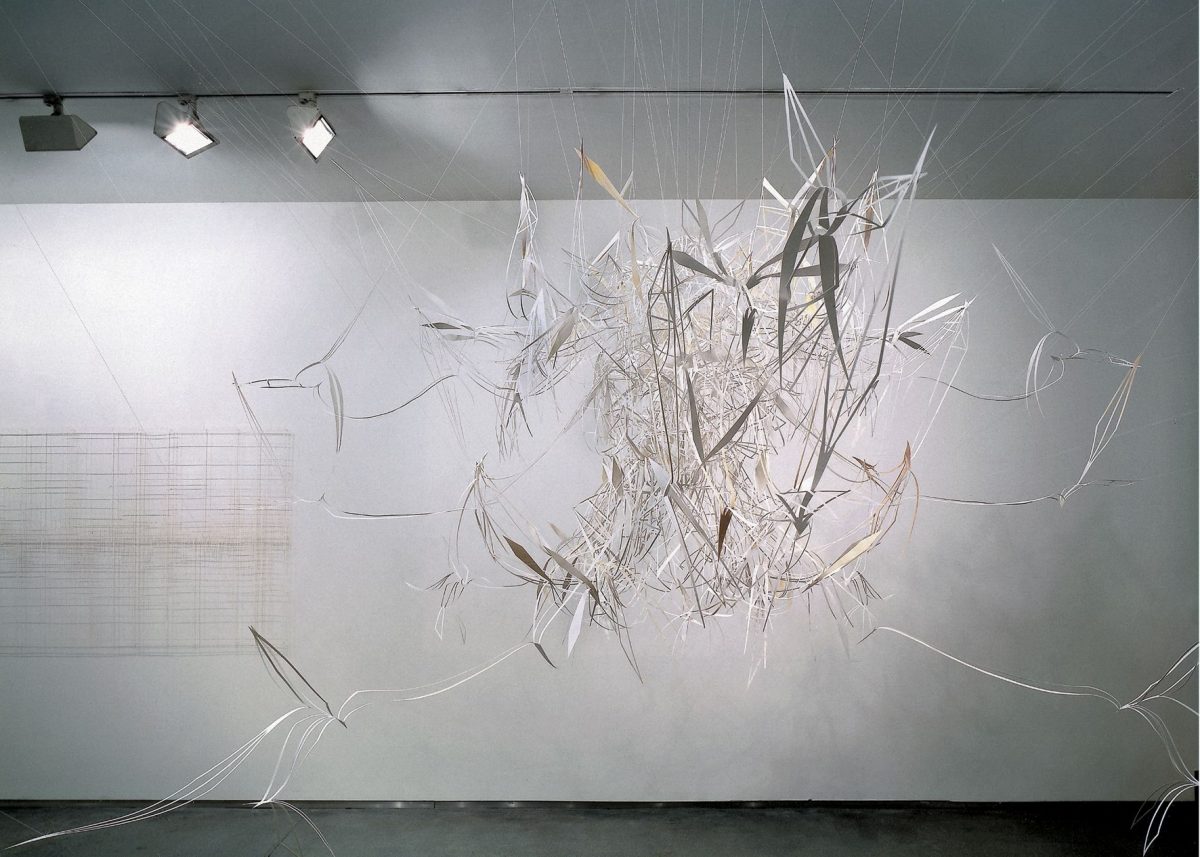<I>vanishing points: light piece with light</I>, 2001
</br>
cut out photographs, thread, glue, 300 x 300 cm / 118.1 x 118.1 in>
