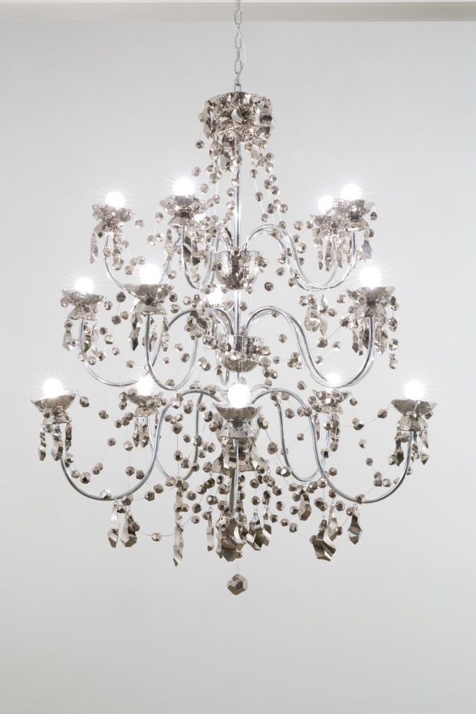<i>platinum chandelier</i>, 2004
</br>
3 tier platinum chandeliers, glazed ceramic, mixed hardware
</br>
122 x 84 cm / 48 x 33 in>