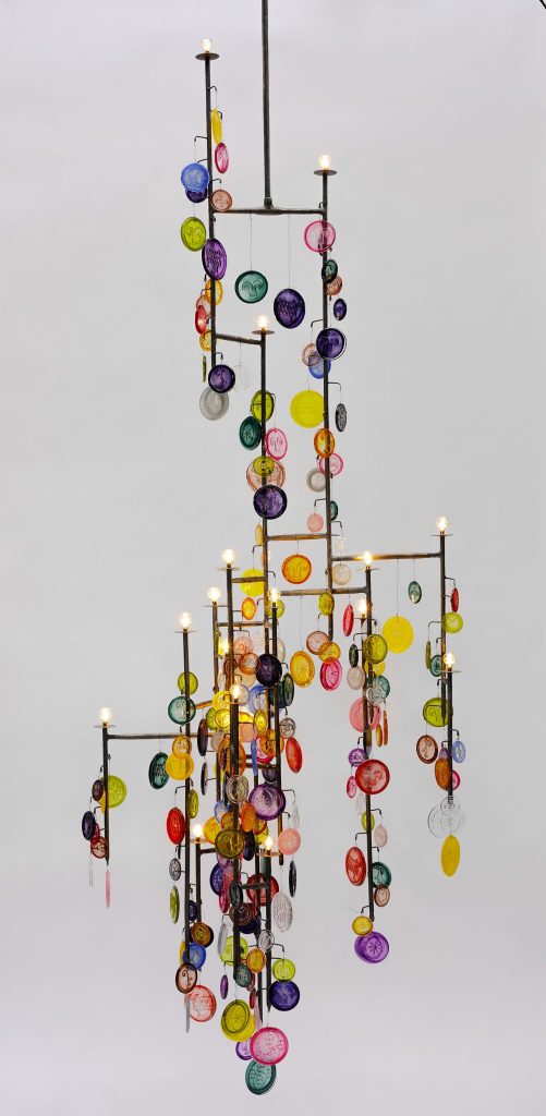 <i>lollipop chandelier (a wizard, a true star)</i>, 2016
</br>
steel pipe with clear powder coating, glass, halogen 
</br>
illuminant, blown glass cover, stainless steel wire, cable
</br>
271,8 x 43,2 x 96,5 cm / 107 x 17 x 38 in>