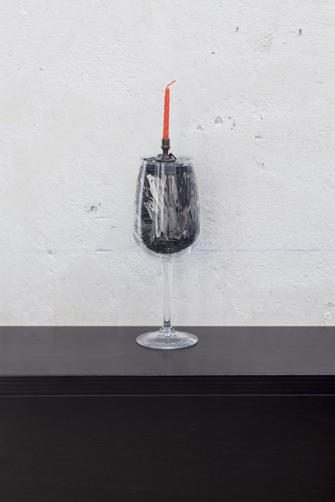 <i>happy birthday to me</i>, 2012</br>
wine glass filled with x-acto blades, brass candle holder, birthday candle</br>30 x 8 cm each