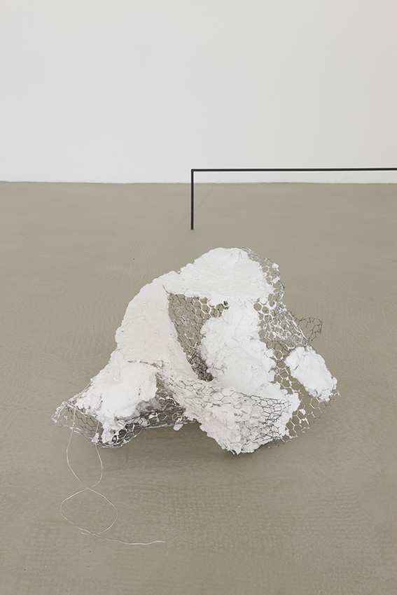 <i>whoever you are</i>, 2010</br>
wire net, plaster and dental floss</br>30 x 85 x 40 cm