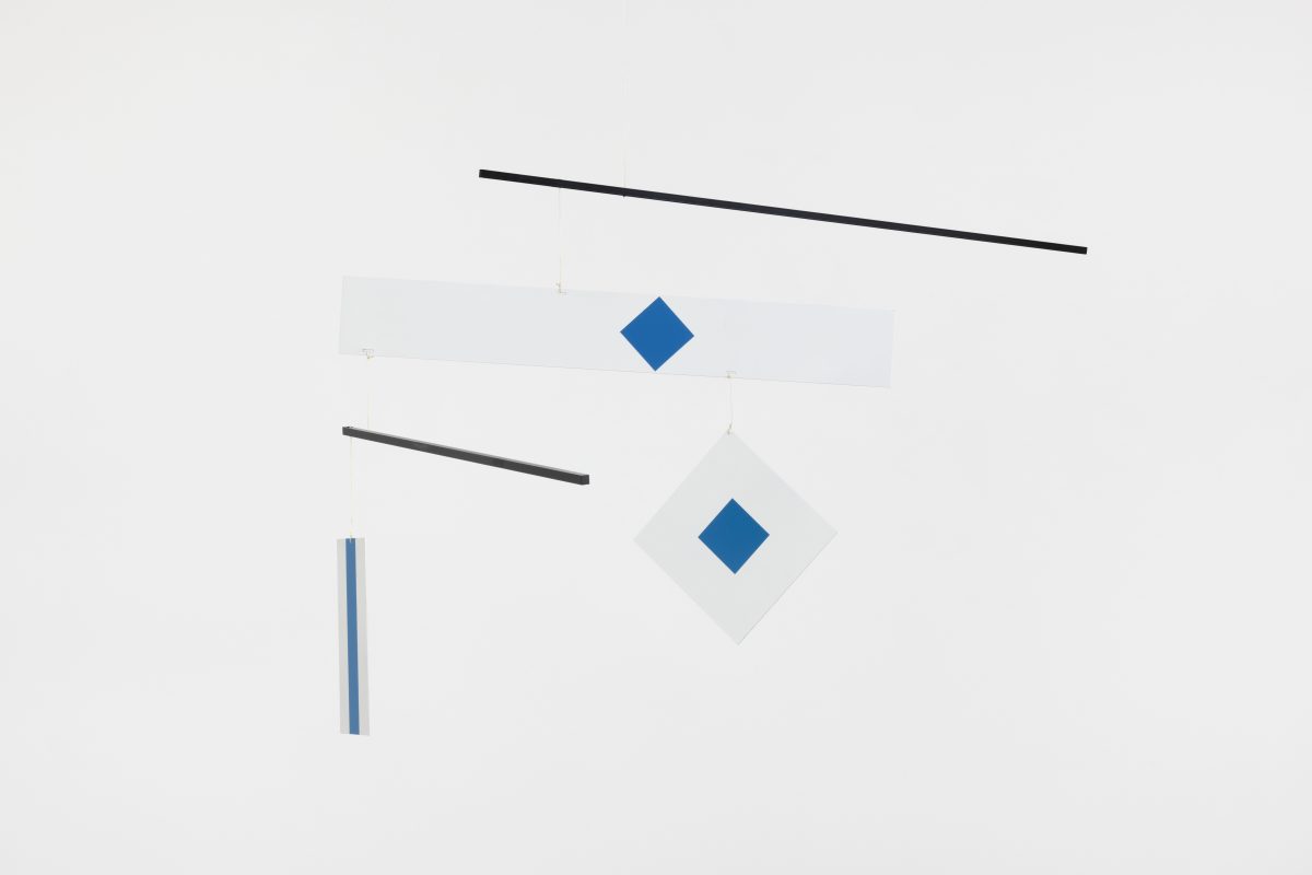 <i>Macchina Inutile</i>, 1994 </br>
screen-printed metal, nylon thread, wood </br>
73 x 150 cm / 28.7 x 59 in
