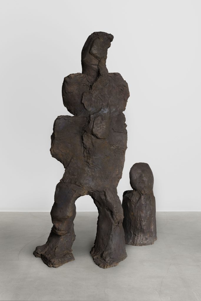 <i>The Walker, </i>2025
</br>
bronze,</br>Walker figure: 170 x 90 x 65 cm / 66.9 x 35.4 x 25.6 in</br>Stone: 75 x 45 x 45 cm / 29.5 x 17.7 x 17.7 in